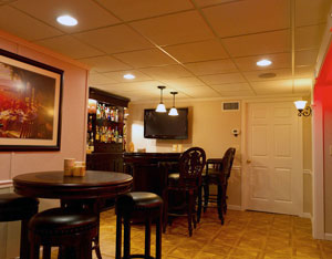 A finished basement TV room in 